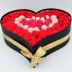 caja en forma de corazon con  rosas entre 80 y 100 und 