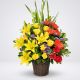 Canasta con flores mixtas premium de colores – Ágatha & Valentina