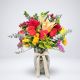 Florero de cristal con flores mixtas de colores – Ágatha & Valentina